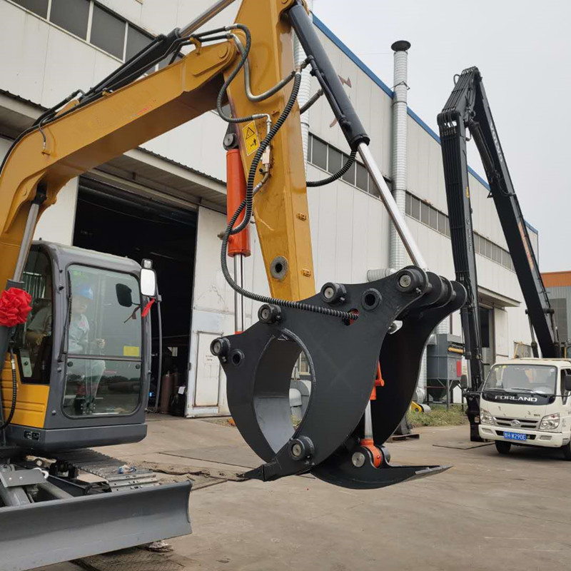 захват для пней экскаватора