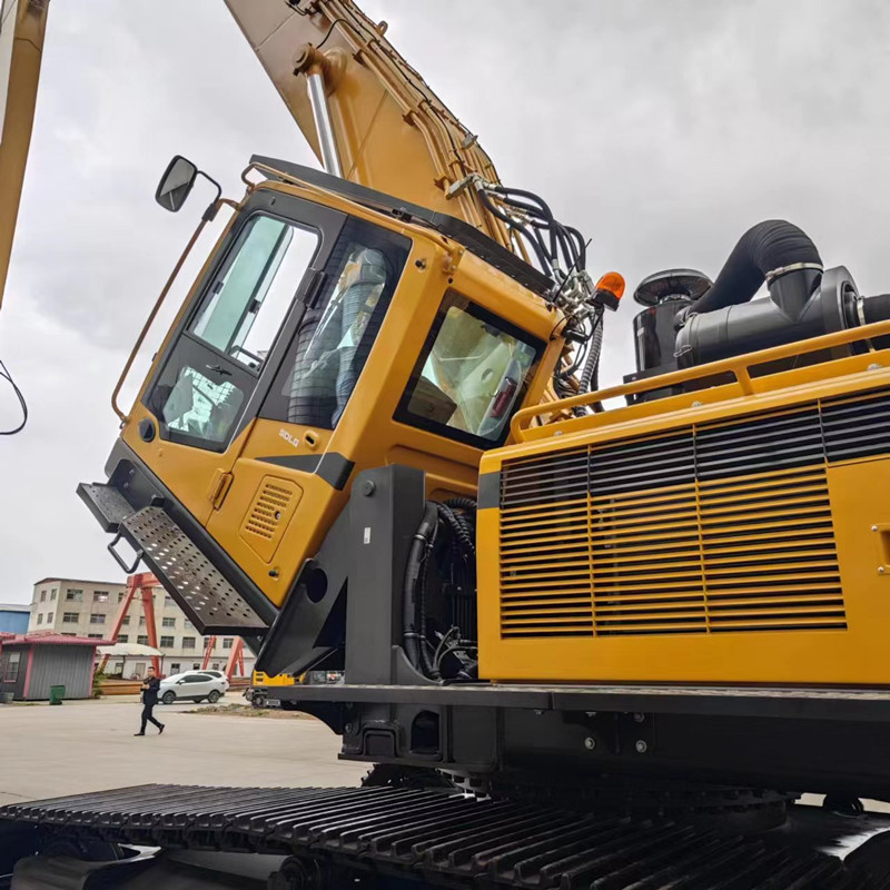 наклоняемая кабина экскаватора